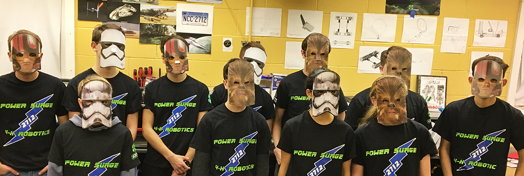 Students in Star Wars character masks and without masks